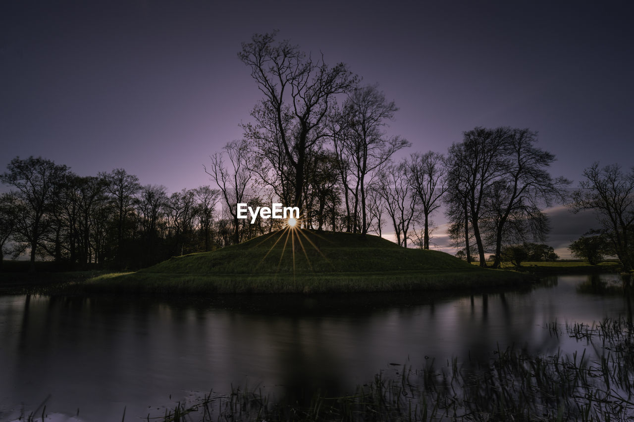 SCENIC VIEW OF LAKE AT NIGHT