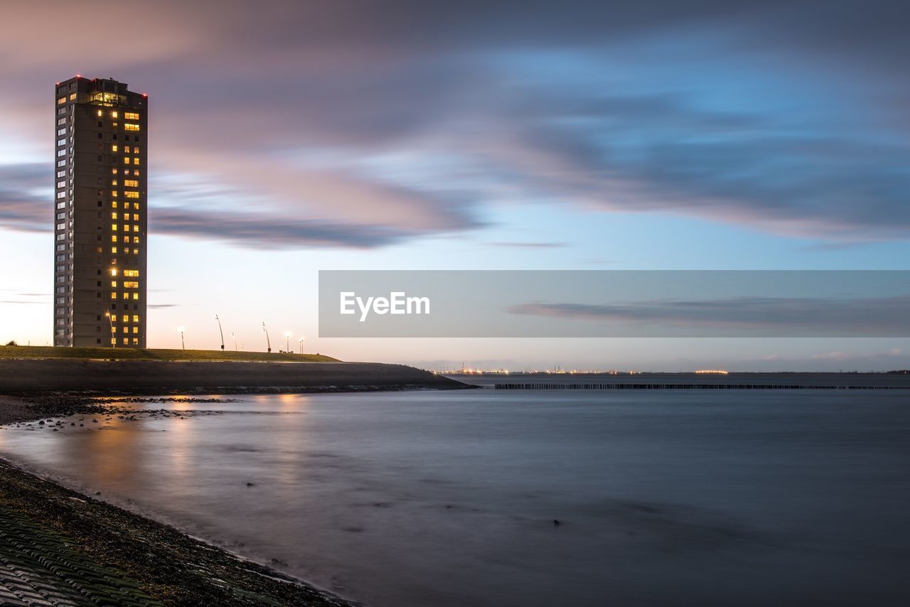 VIEW OF CLOUDY SKY OVER CITY