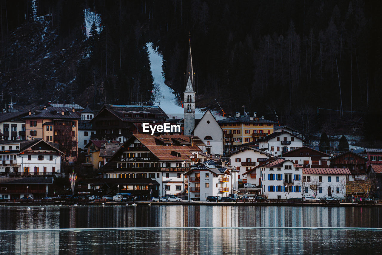 Buildings in city at night