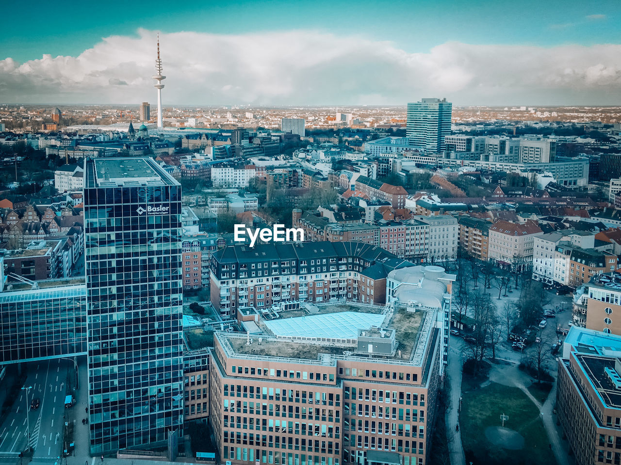 High angle view of buildings in city against sky