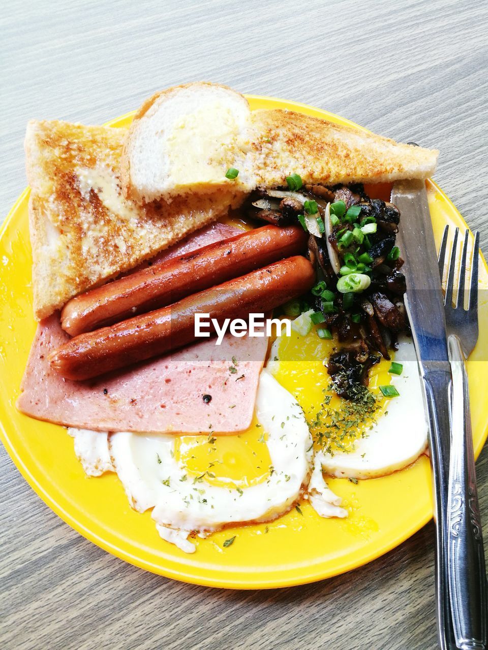 High angle view of breakfast in plate on table