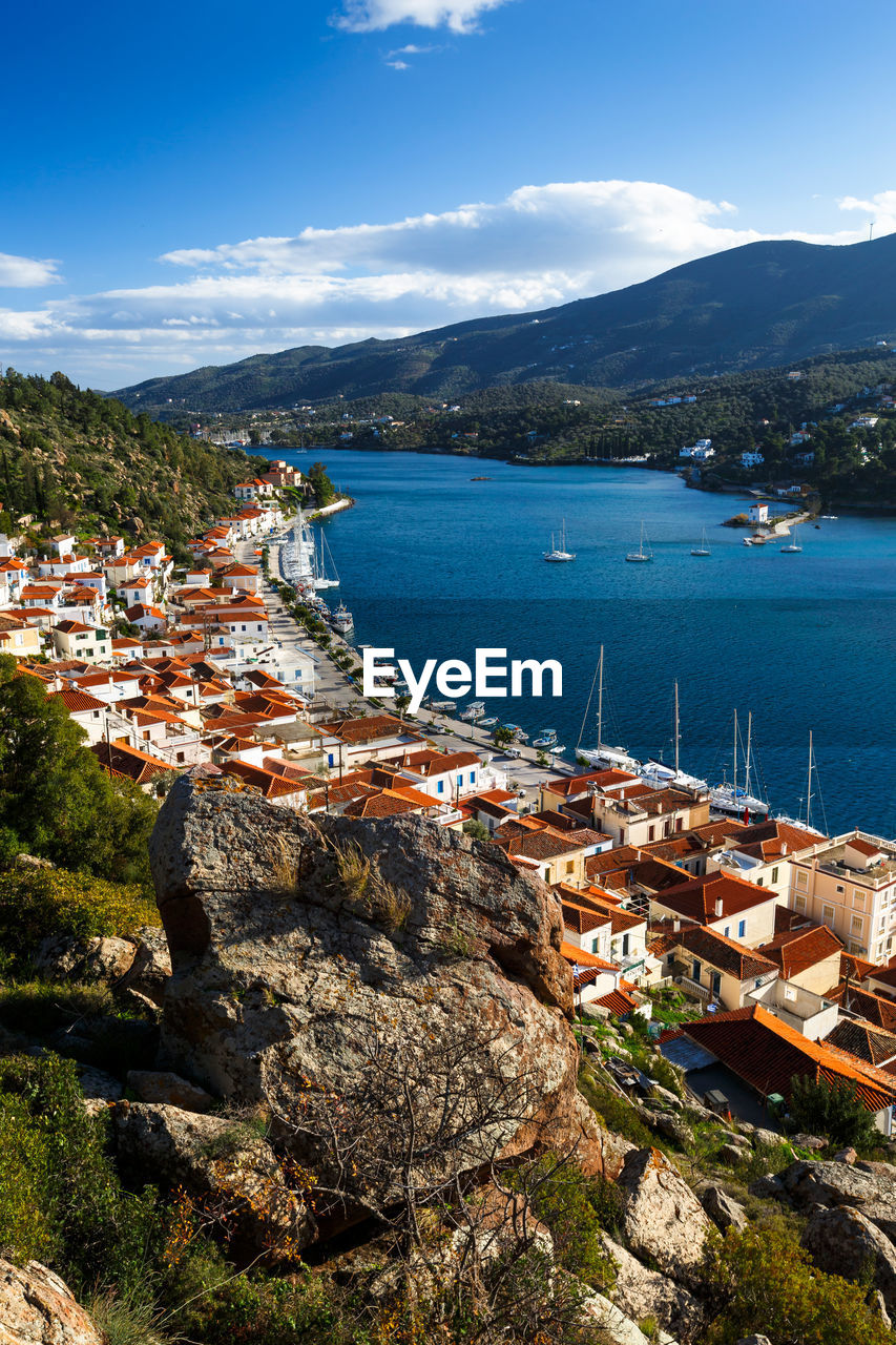 View of the chora village of poros island from a nearby hill, greece.