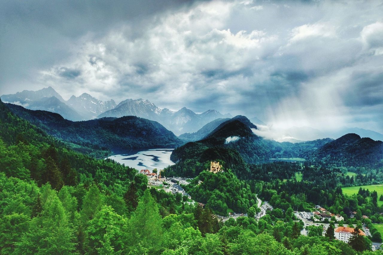 Scenic view of landscape against cloudy sky