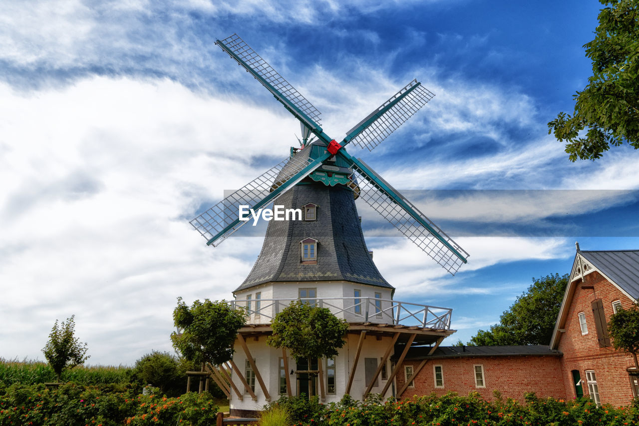 TRADITIONAL WINDMILL AGAINST SKY