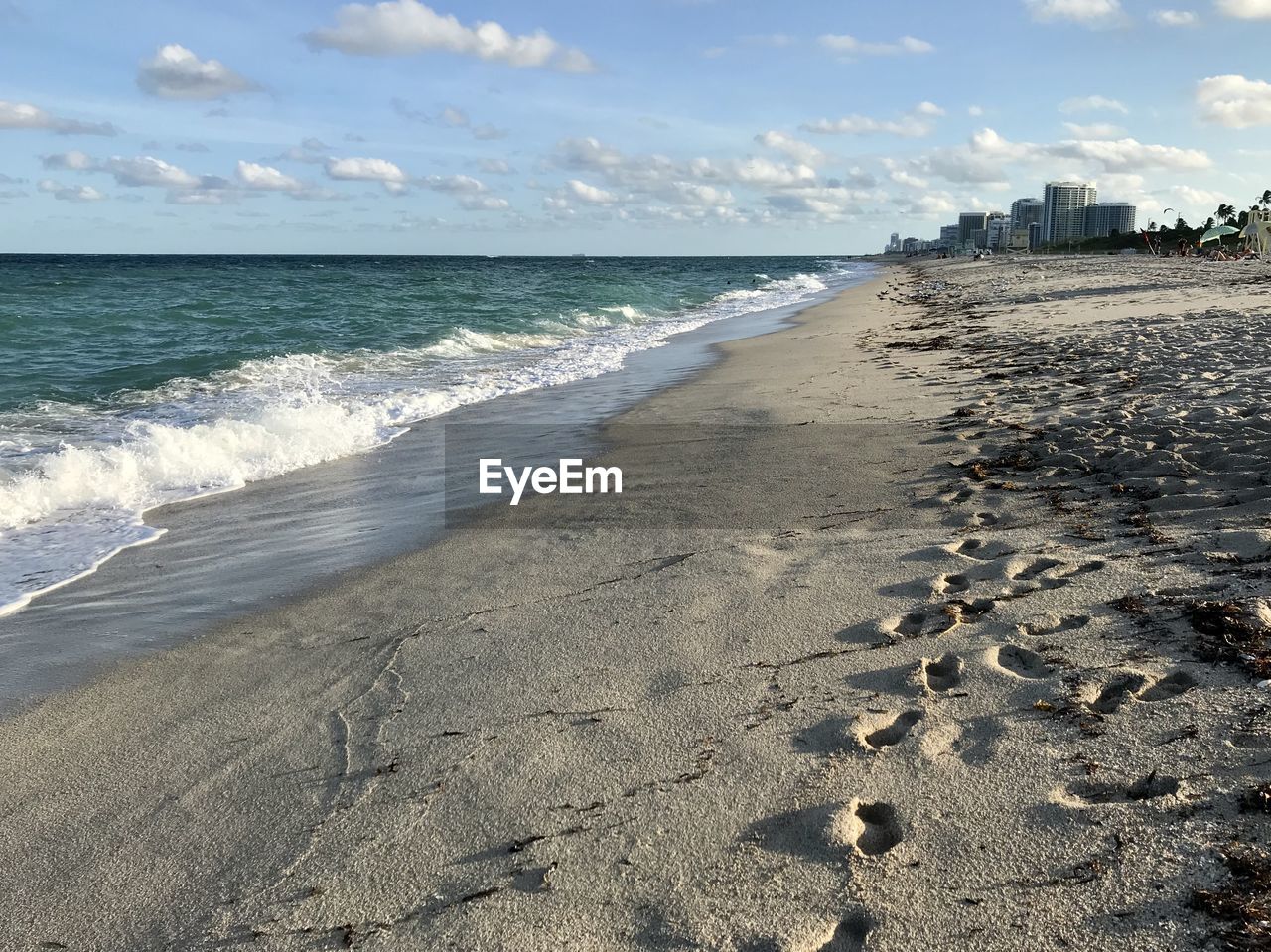Scenic view of beach against sky