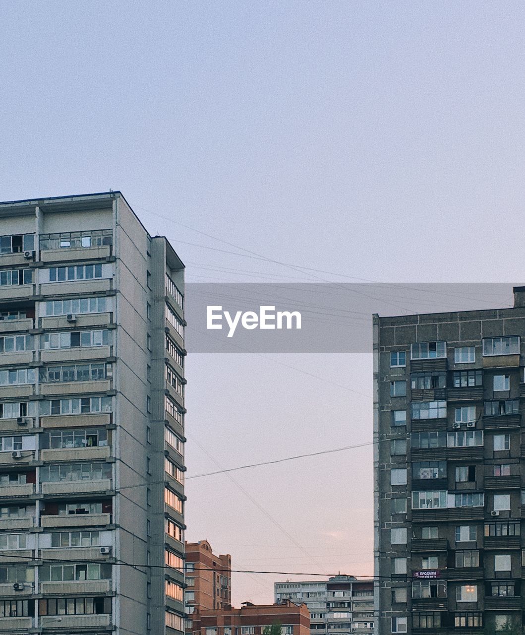 Low angle view of buildings against clear sky