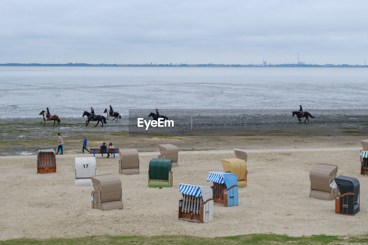 GROUP OF PEOPLE AT BEACH