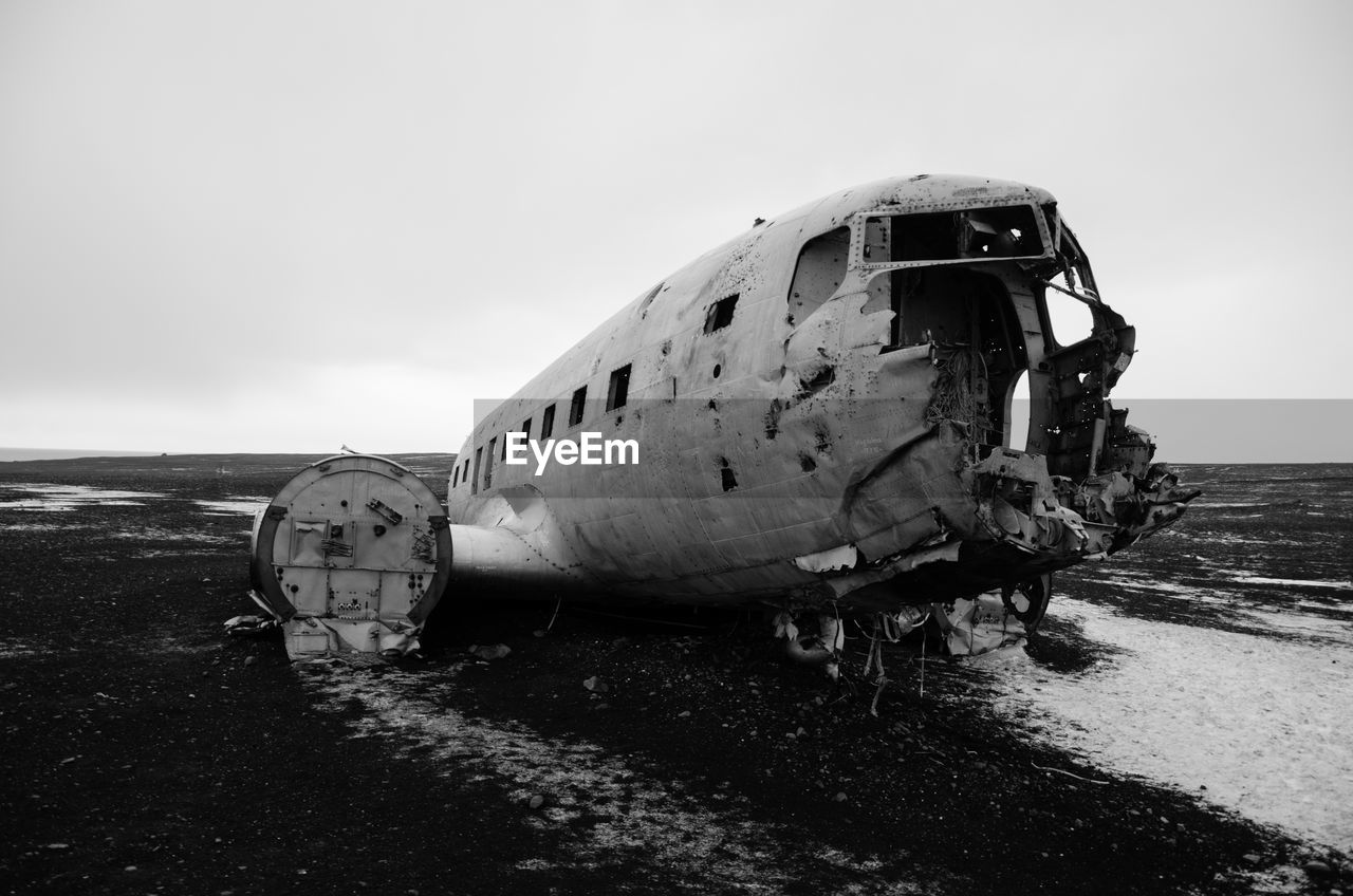 ABANDONED AIRPLANE ON BEACH