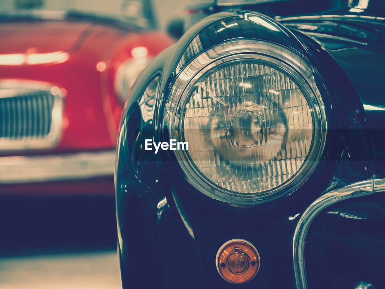Close-up of vintage car headlight
