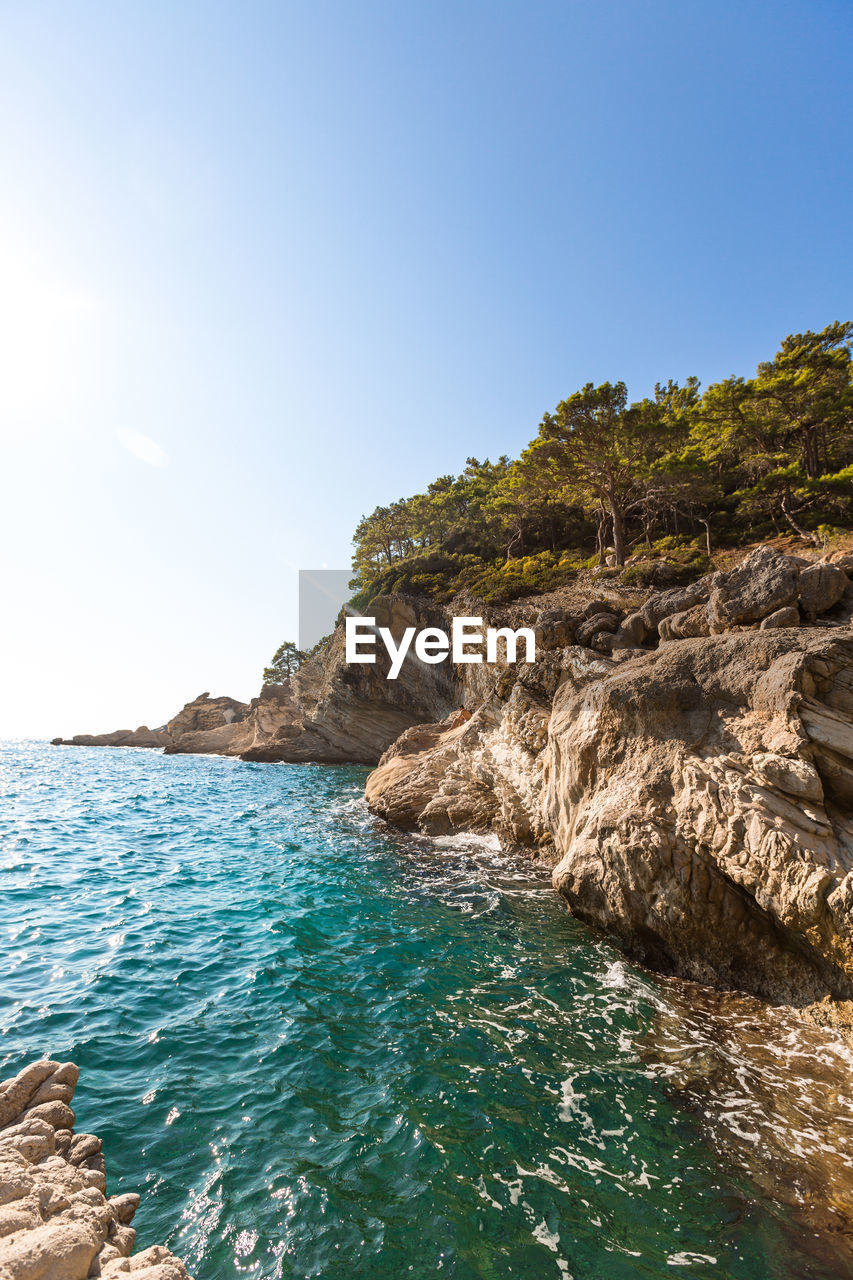 Beautiful landscape with azure sea and big rocky mountains in summer