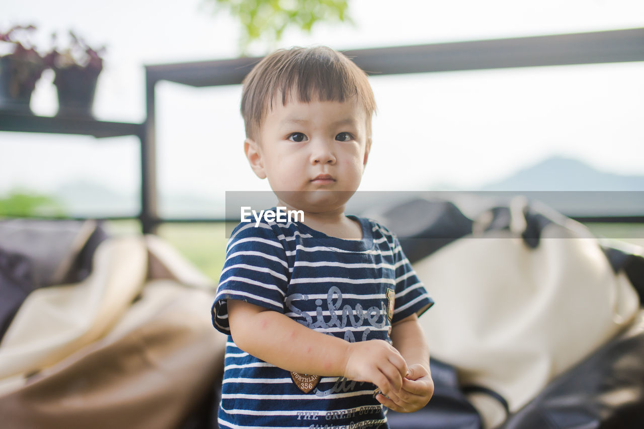 Portrait of cute boy at home