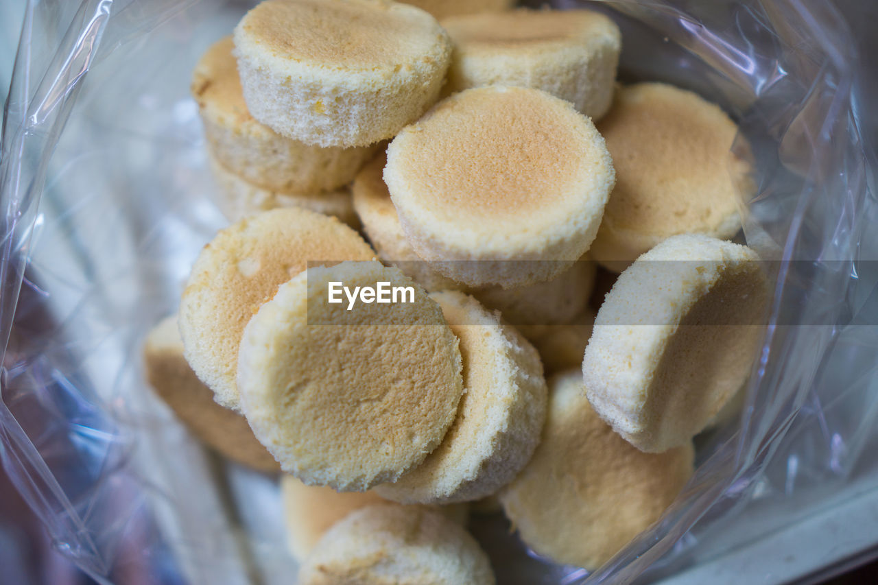 HIGH ANGLE VIEW OF COOKIES IN GLASS