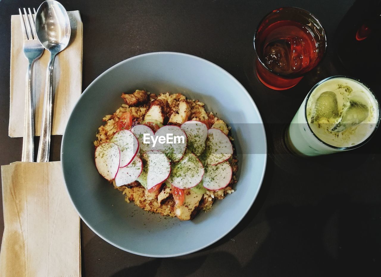 HIGH ANGLE VIEW OF BREAKFAST IN BOWL ON TABLE