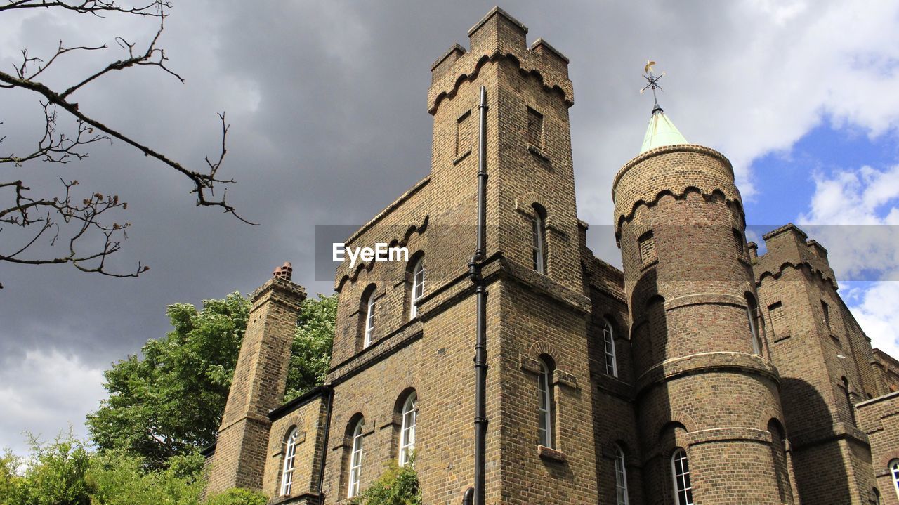 Low angle view of historical building against sky