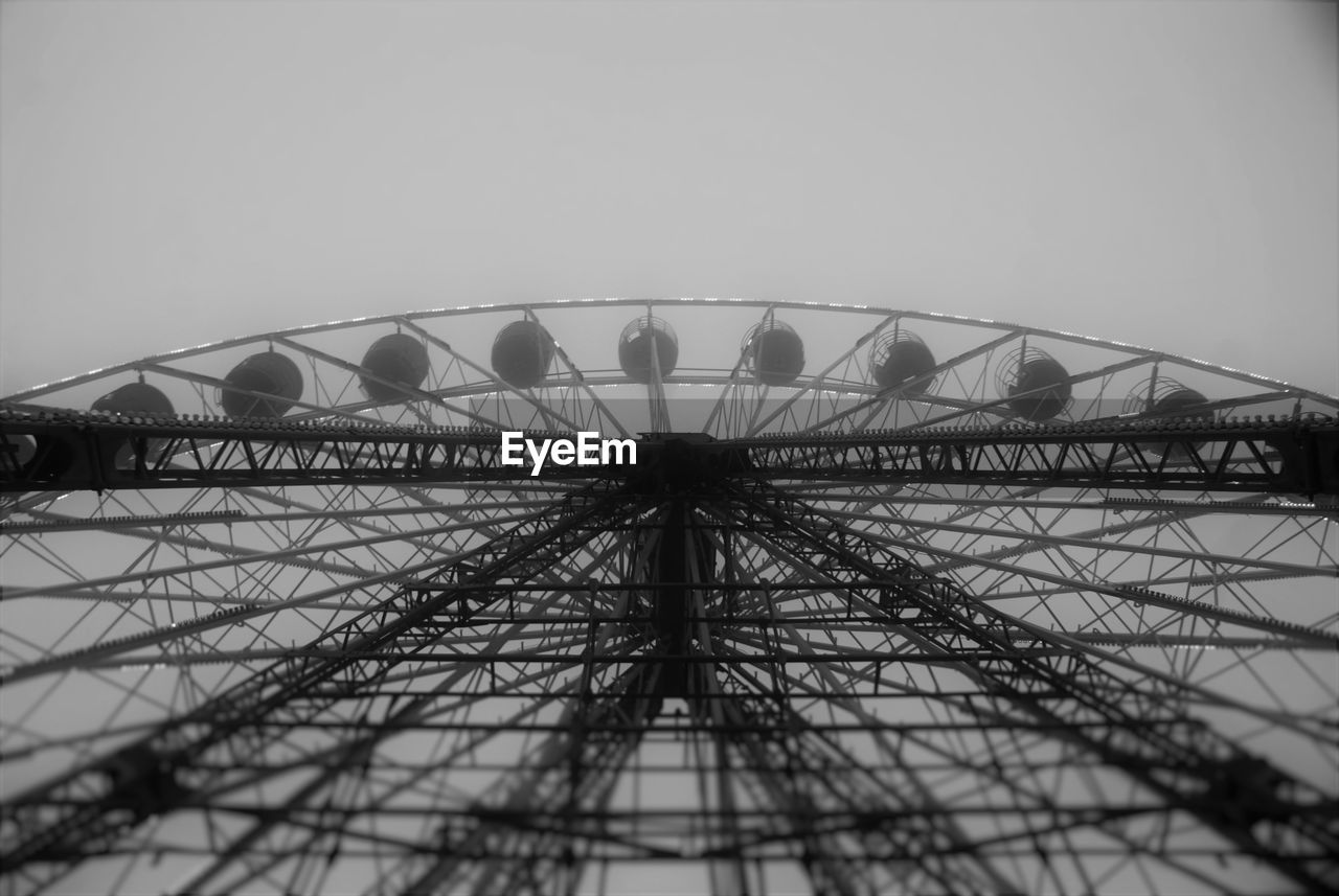 LOW ANGLE VIEW OF FERRIS WHEEL AGAINST SKY