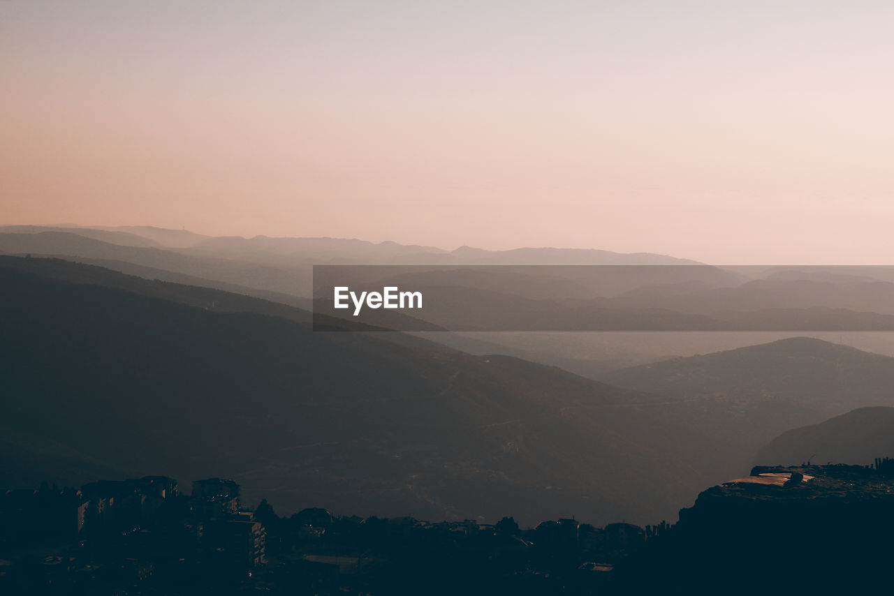 Scenic view of mountains against clear sky