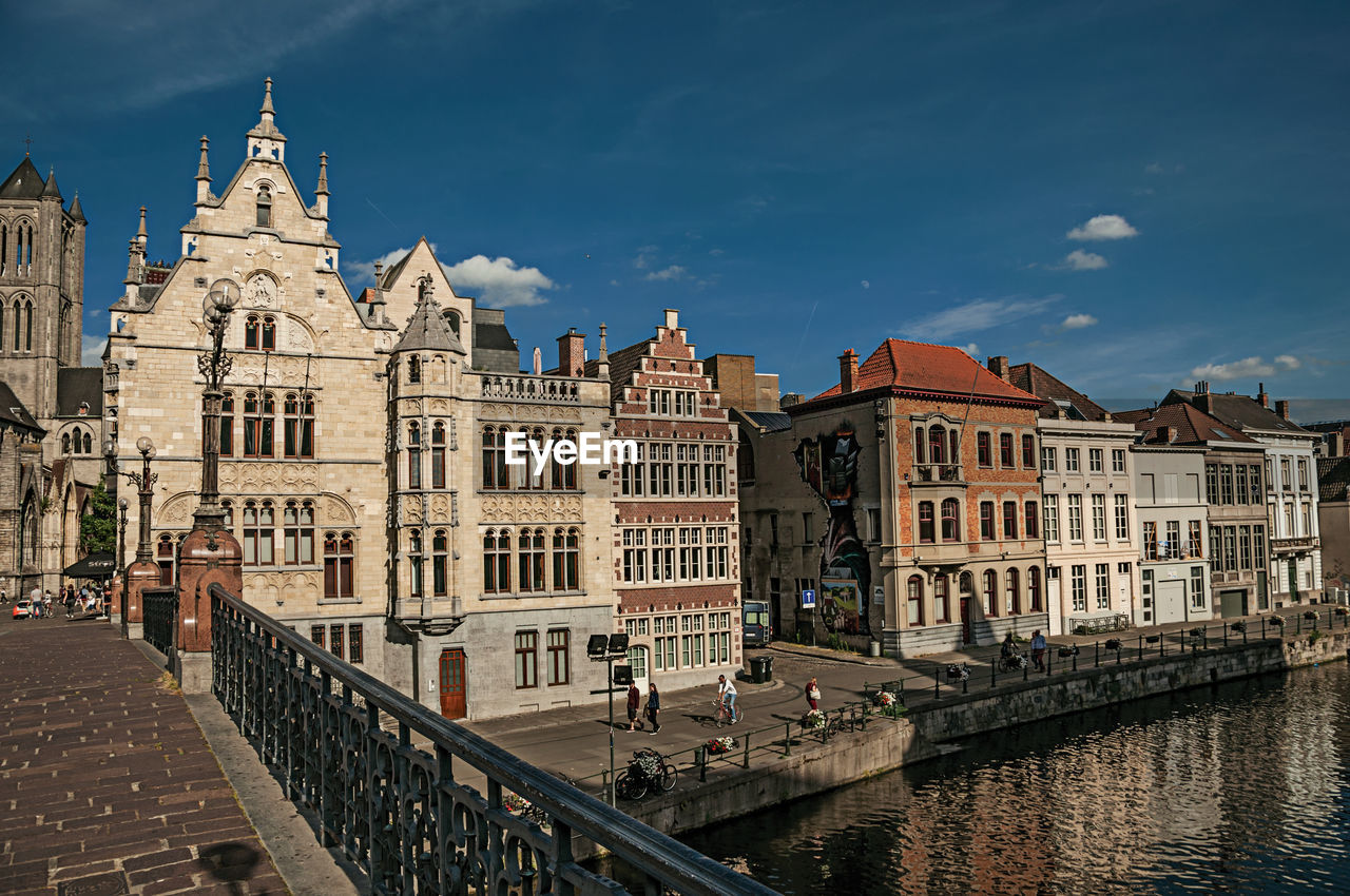 St. michael bridge and gothic buildings in ghent. a city full of gothic buildings in belgium.