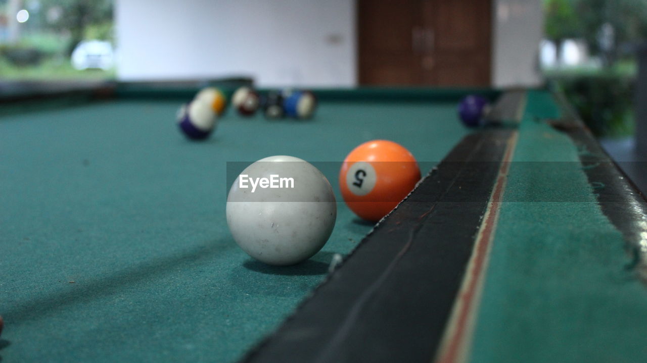 billiards, pool ball, sports, pool table, ball, pool sport, table, recreation, leisure activity, billiard table, indoor games and sports, pool cue, billiard room, game, nine-ball, relaxation, billiard ball, leisure games, snooker, eight-ball, cue stick, sphere, indoors, cue ball, individual sports, pool hall