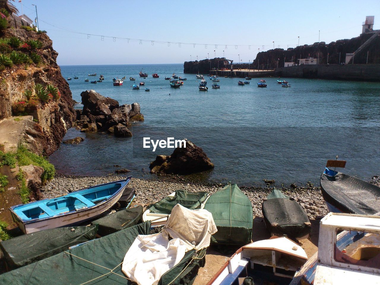 VIEW OF ROCKS IN SEA