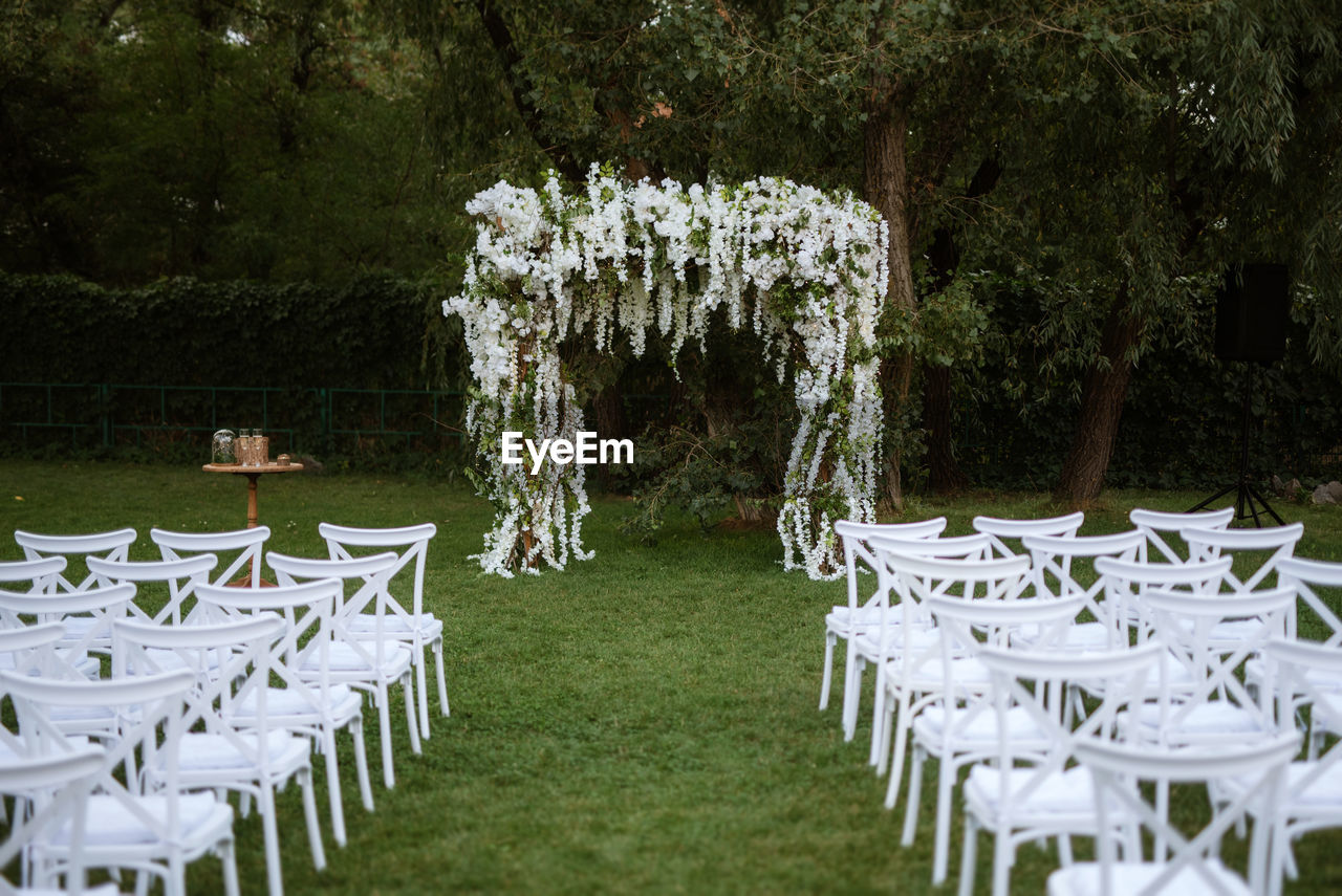 empty chairs and tables in yard