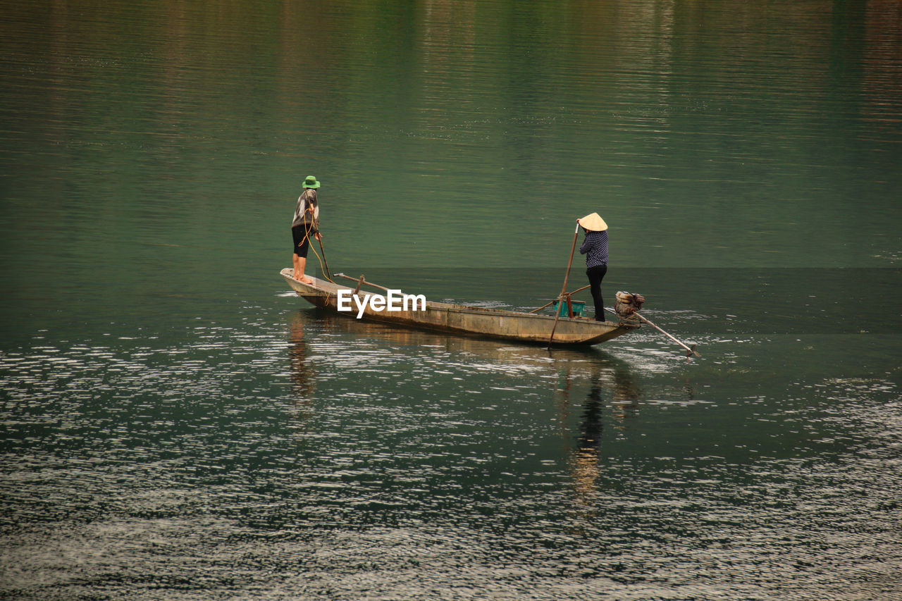 High angle view of people on a wooden boat in phong nha, vietnam