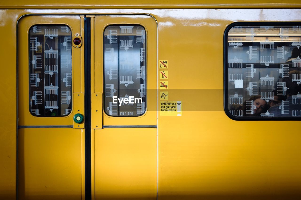 FULL FRAME SHOT OF TRAIN AT WINDOW