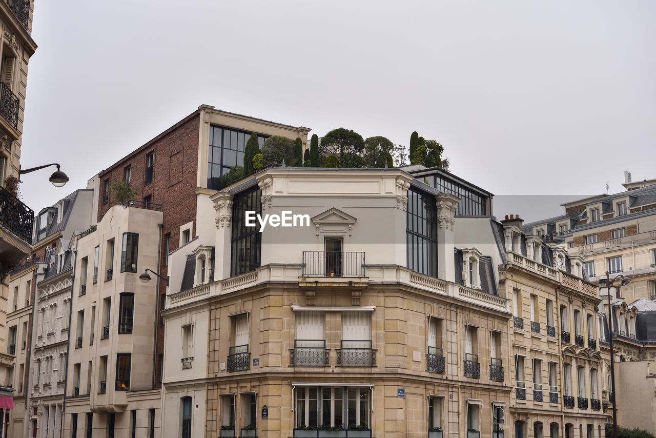 architecture, building exterior, built structure, building, city, neighbourhood, residential district, urban area, town, facade, sky, house, window, apartment, nature, history, cityscape, travel destinations, the past, no people, old, landmark, tourism, street, travel, business finance and industry, cut out, low angle view, waterway, outdoors, downtown, abstract, environment, residential area, city street, tower block, clear sky, day, estate, community