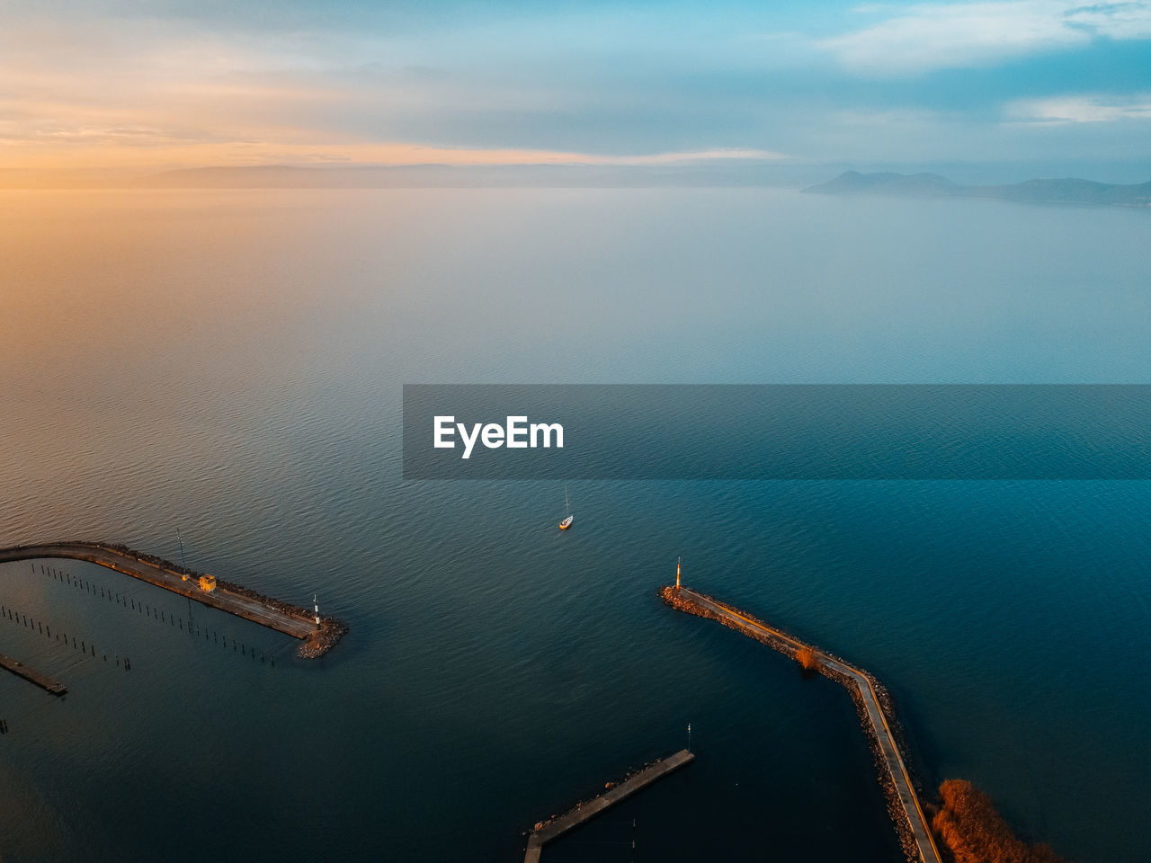 High angle view of sea against sky during sunset