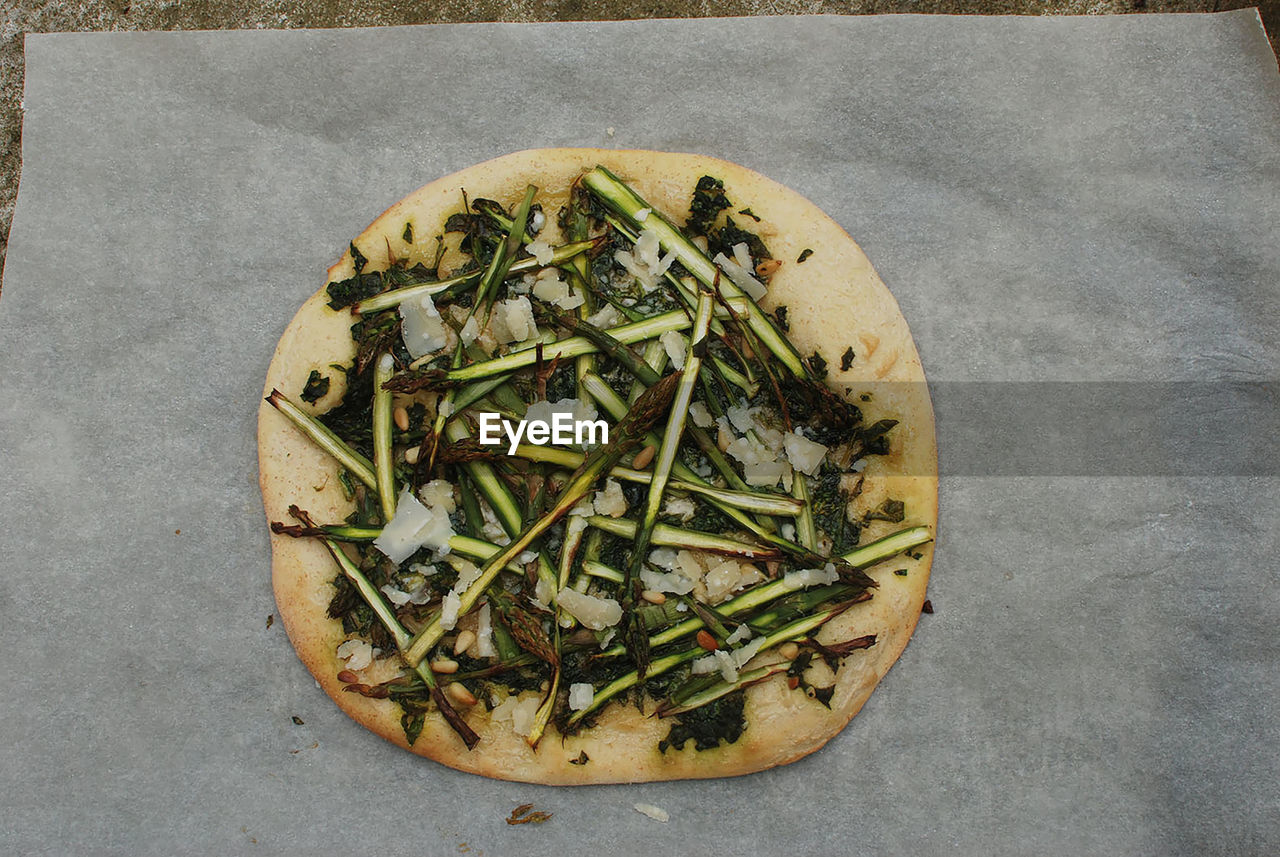 High angle view of pizza in plate on table