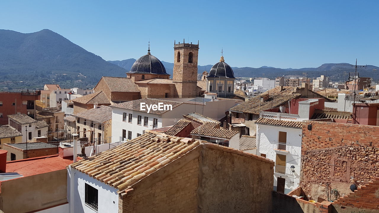 BUILDINGS IN TOWN AGAINST SKY