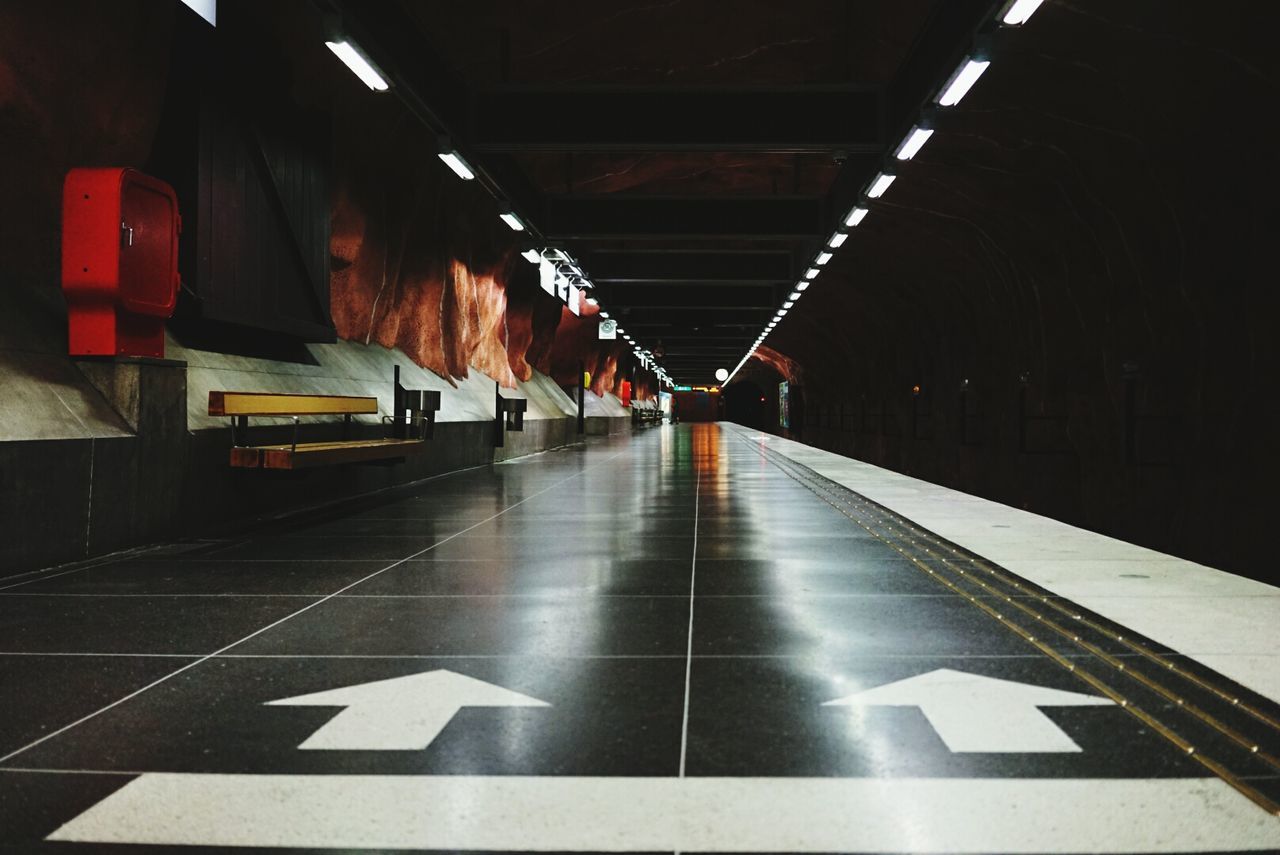 Empty railroad station at night
