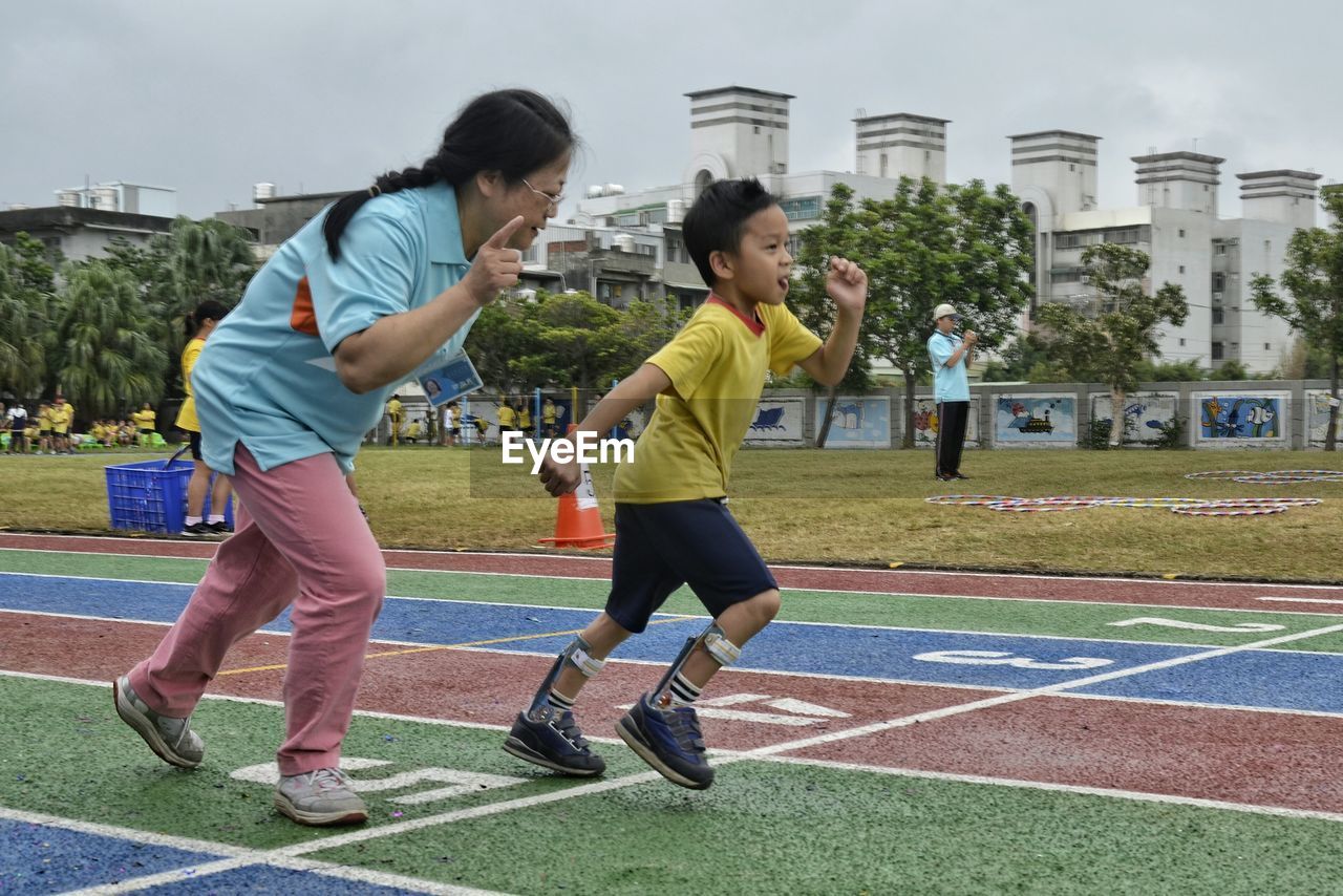 LITTLE GIRL PLAYING IN PARK