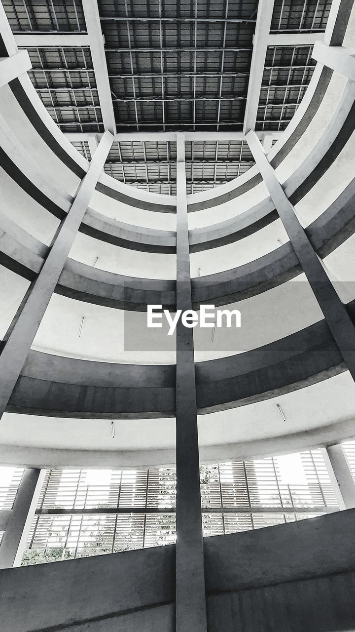 Low angle view of  spiral ramp in car park building