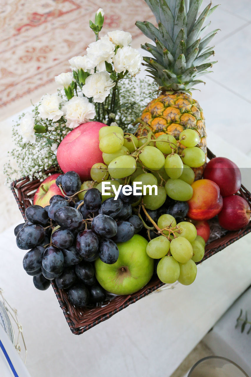 HIGH ANGLE VIEW OF FRUITS IN CONTAINER