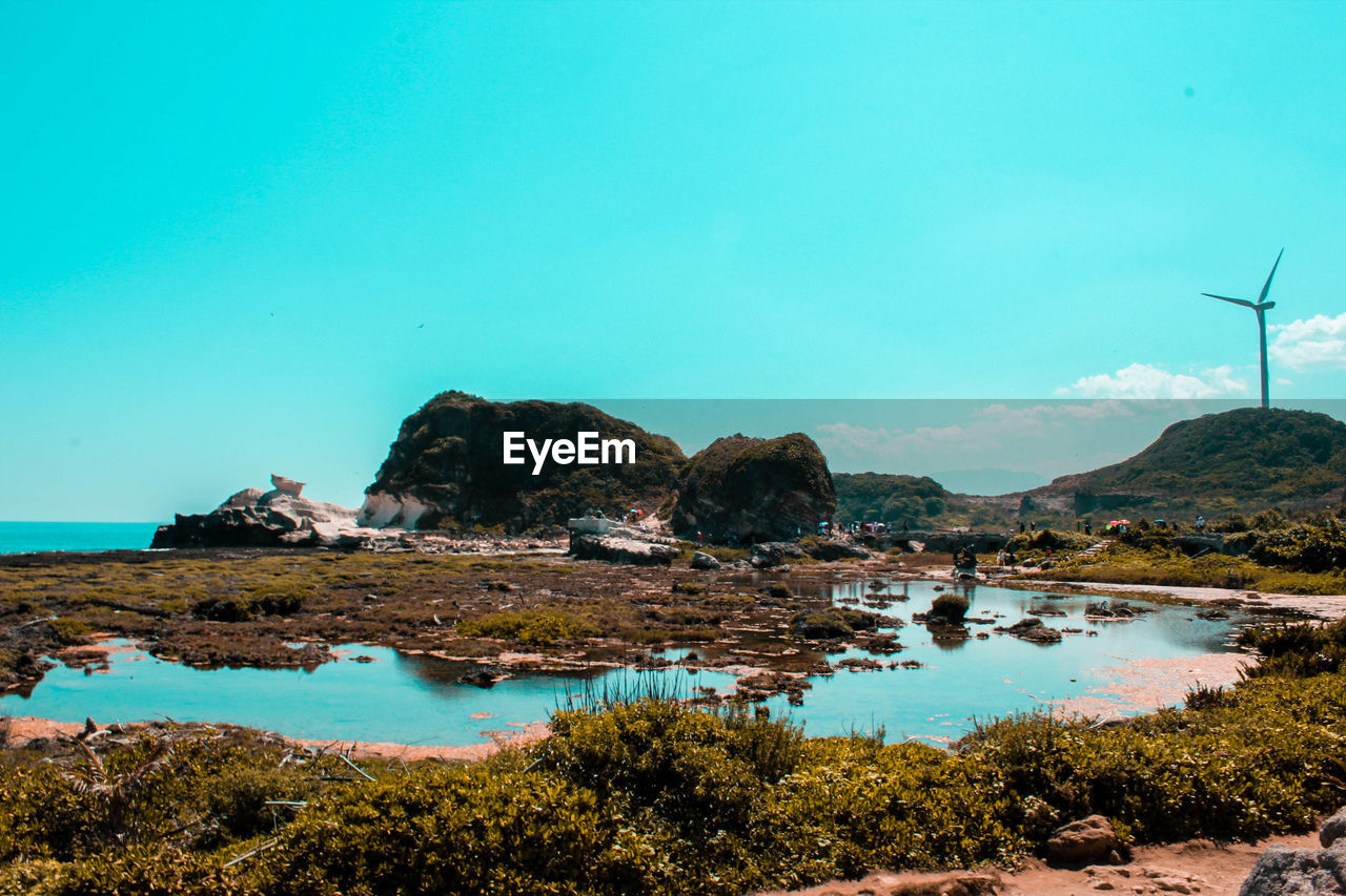 SCENIC VIEW OF SEA AGAINST BLUE SKY