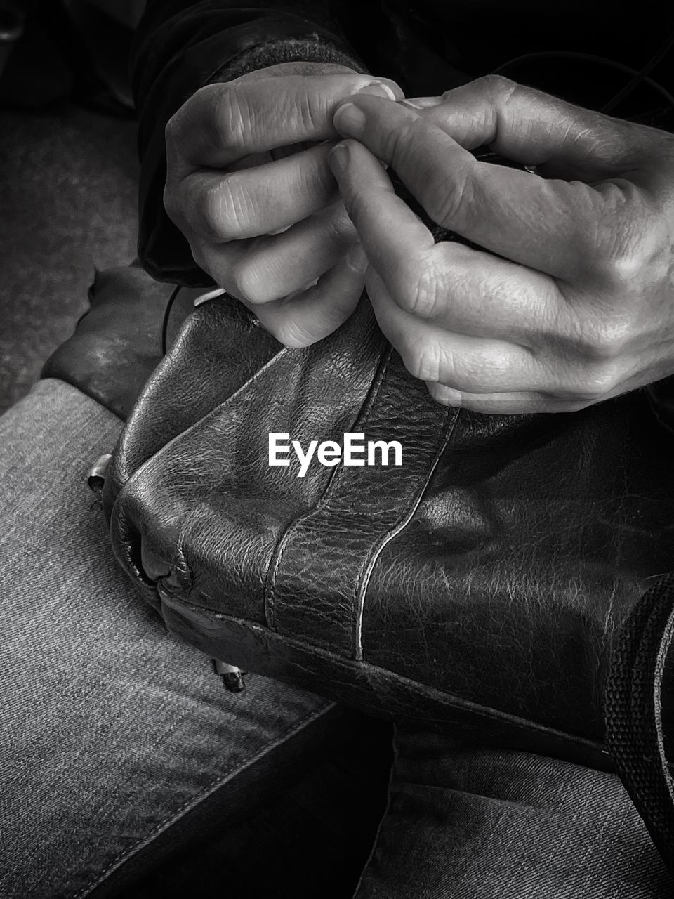 black, hand, black and white, one person, monochrome, adult, monochrome photography, close-up, arm, indoors, men, clothing, leather, human leg, finger, footwear, lifestyles, person