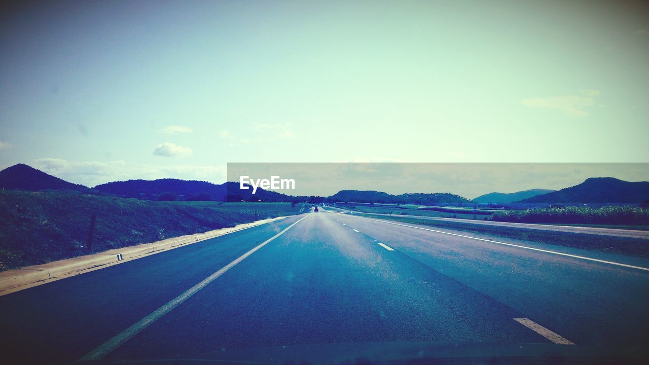 View of road from car windshield