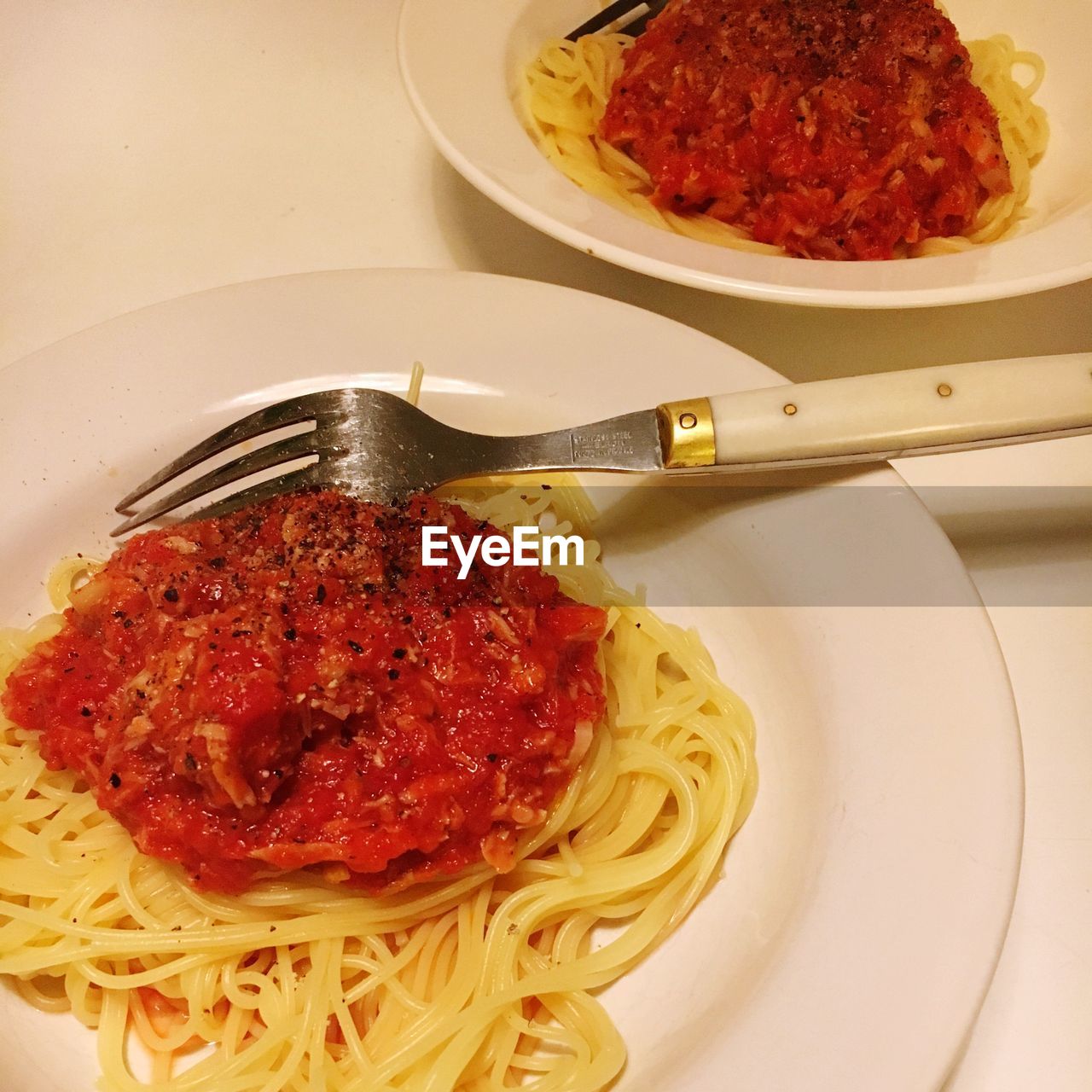 High angle view of pasta in plate on table