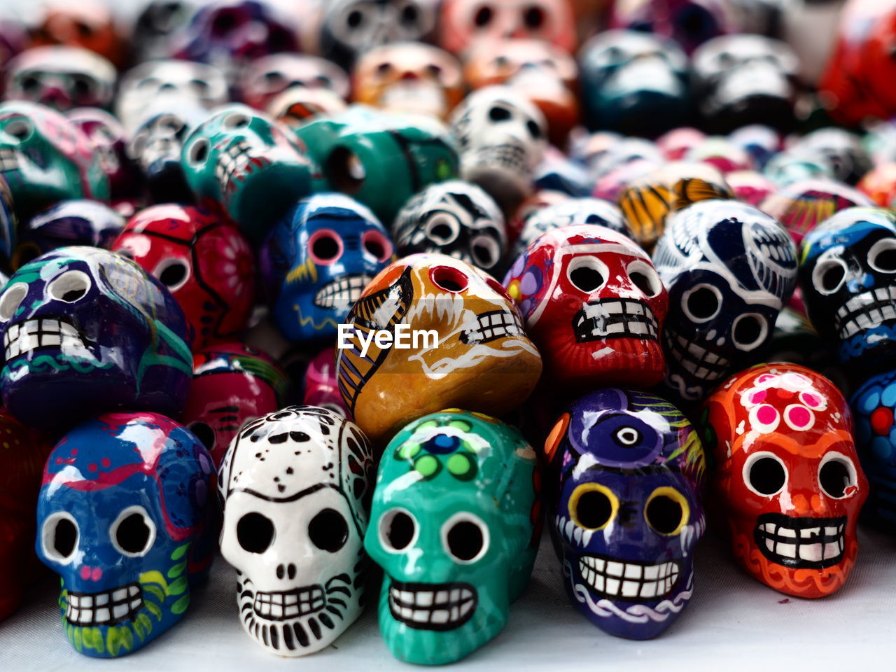 Close-up of colorful skull figurines for sale