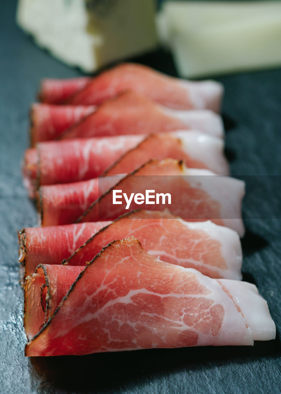 Close-up of meat on slate