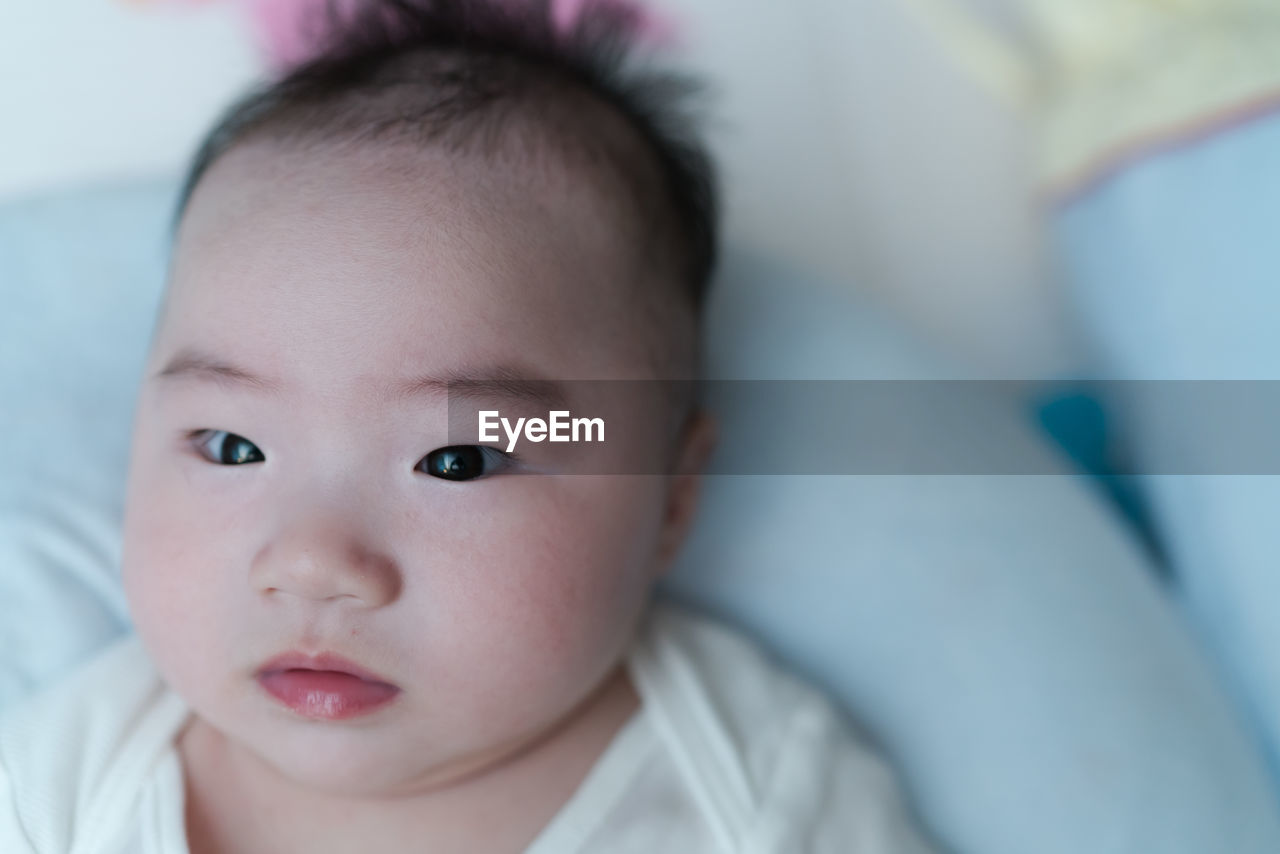 CLOSE-UP PORTRAIT OF CUTE BABY BOY