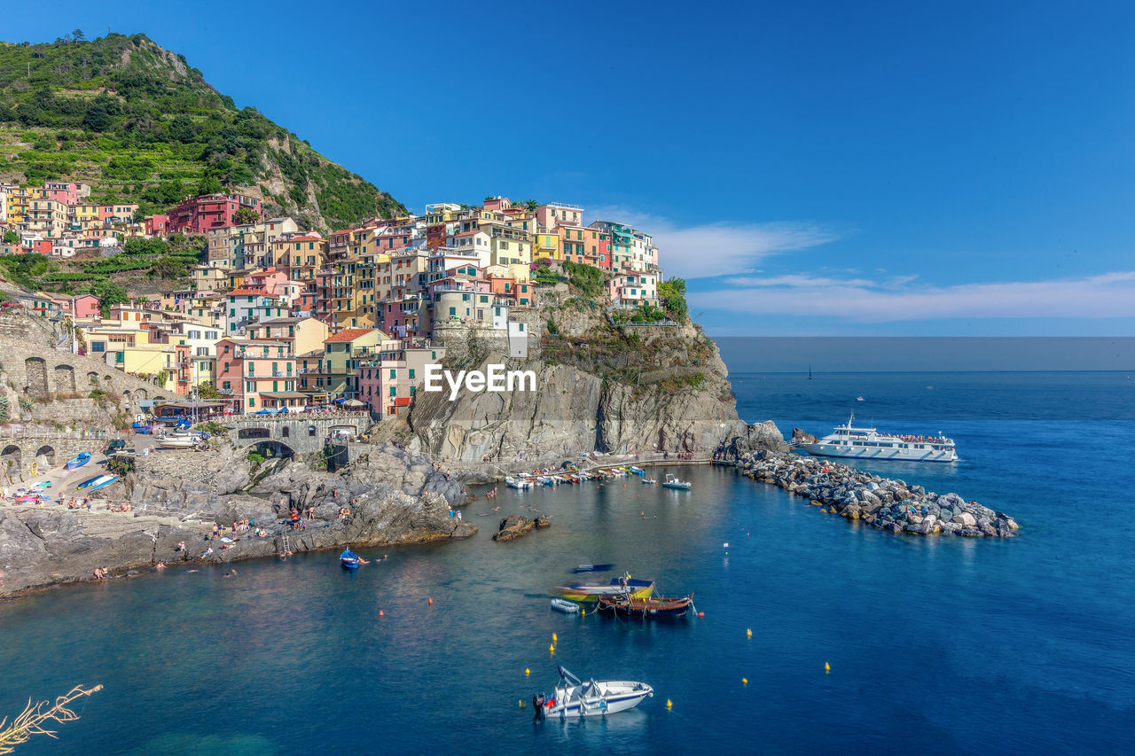 View of village houses  and sea bay of  manarola village at cinque terre area,  italy,  june, 2019.