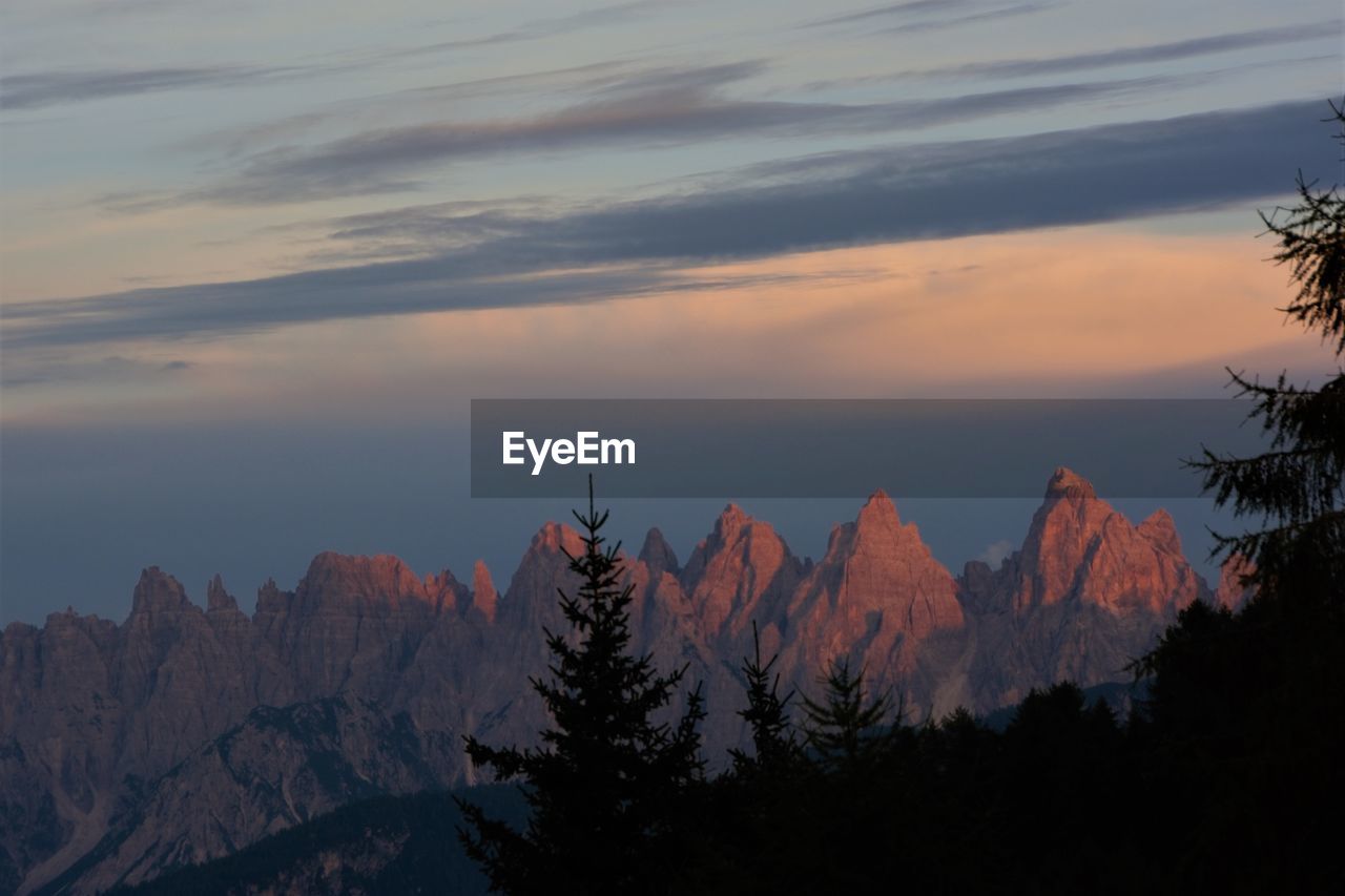 Scenic view of mountains against sky during sunset