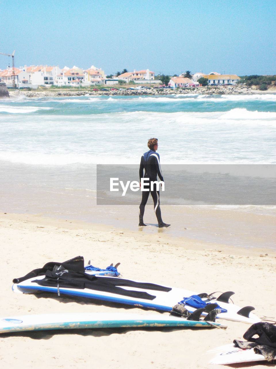 FULL LENGTH OF MAN ON BEACH