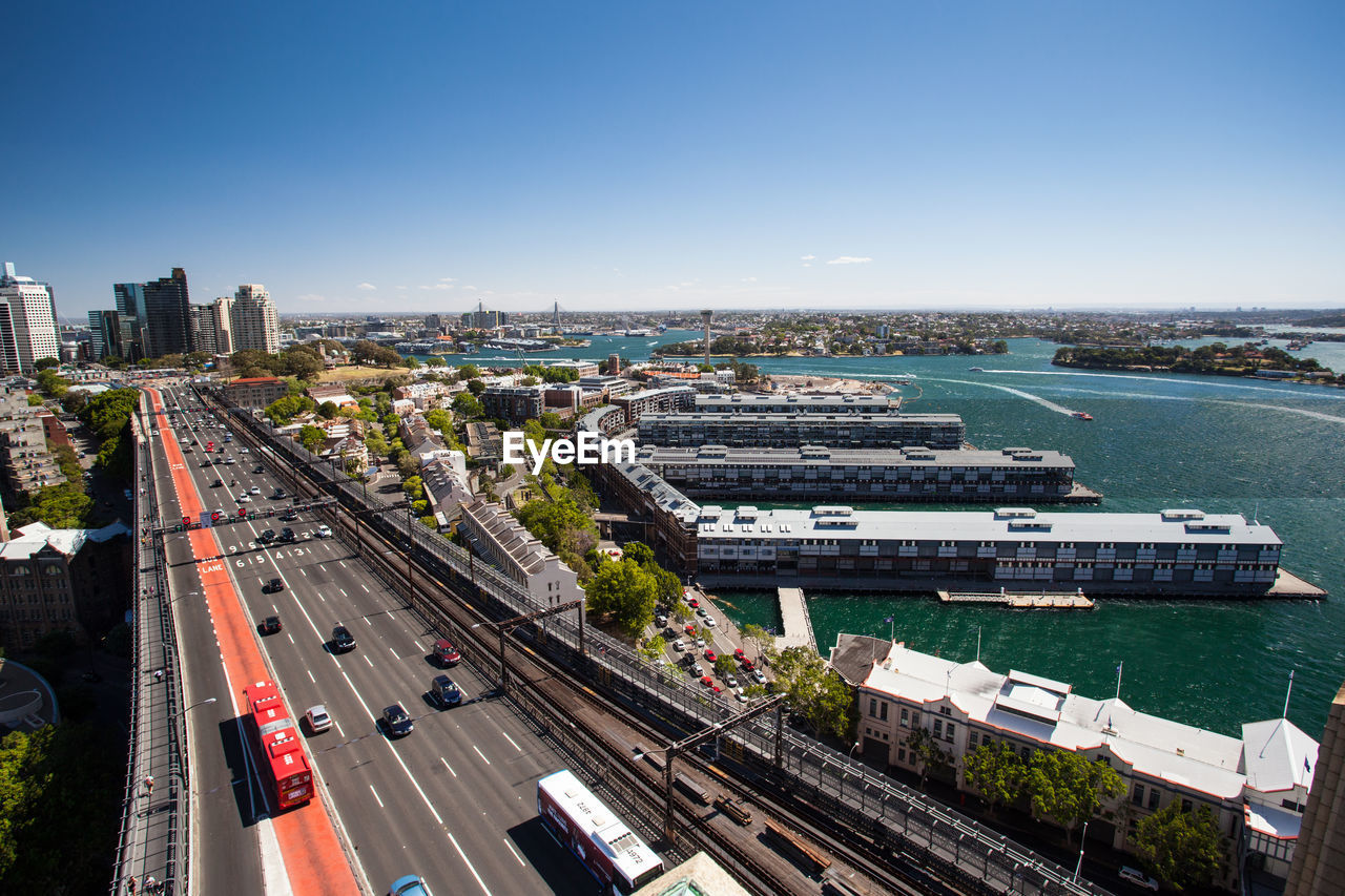 HIGH ANGLE VIEW OF CITY AGAINST CLEAR SKY