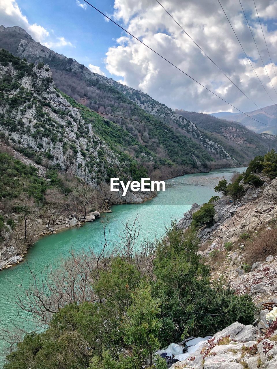 Scenic view of landscape and mountains against sky