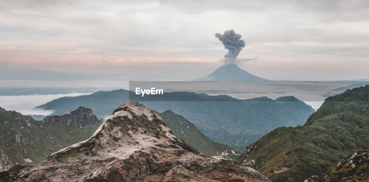 View of active volcano at dusk