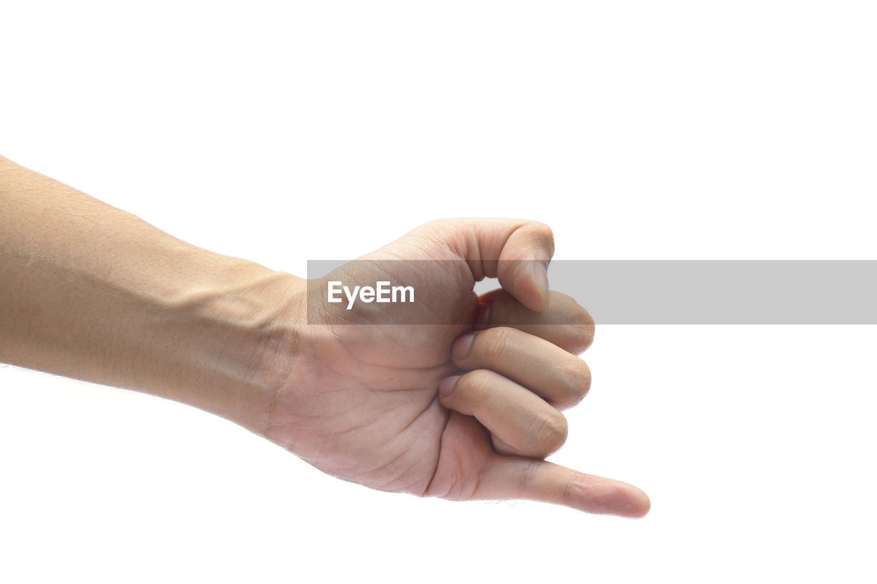 Cropped hand gesturing against white background