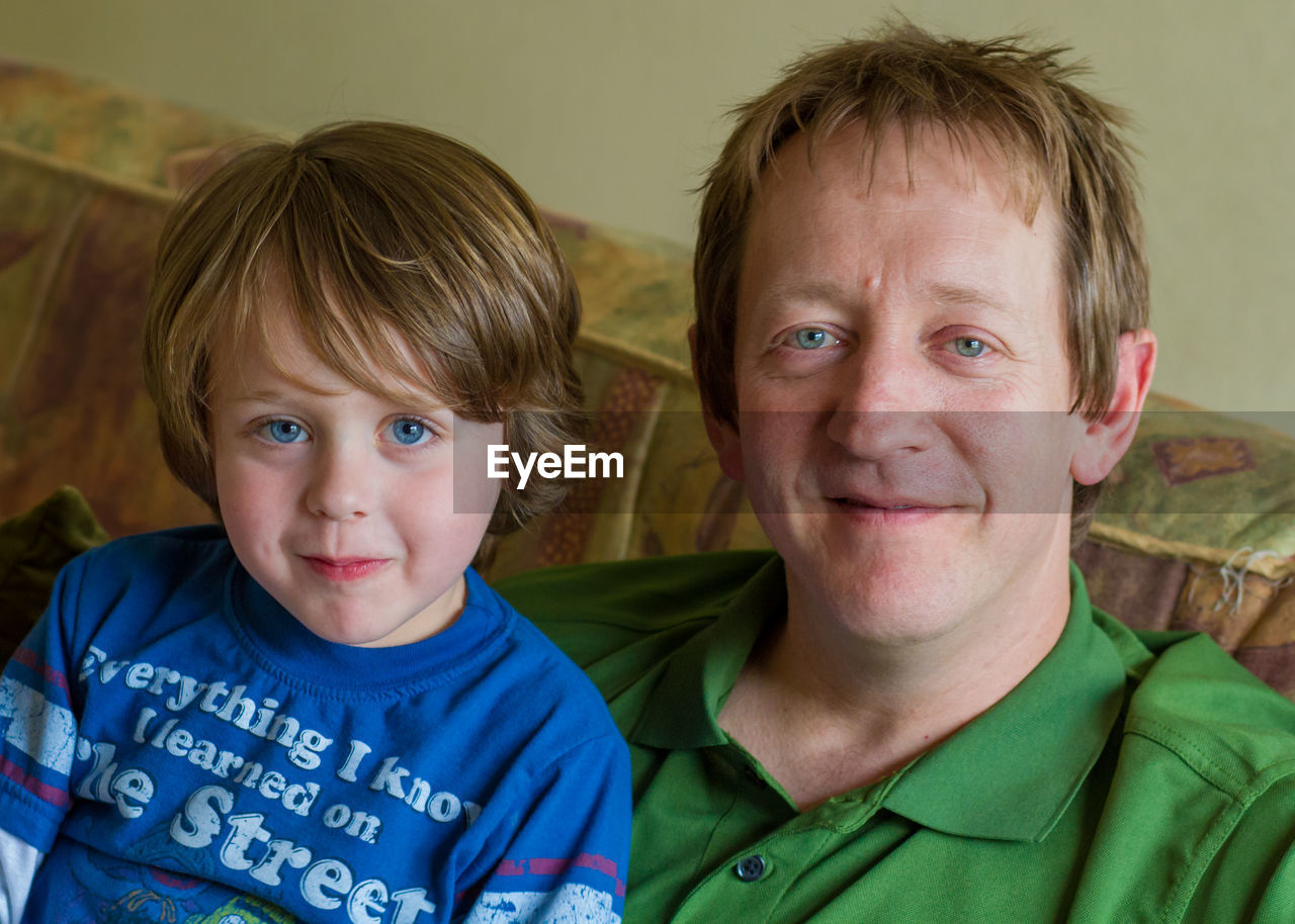 Portrait of smiling father and son