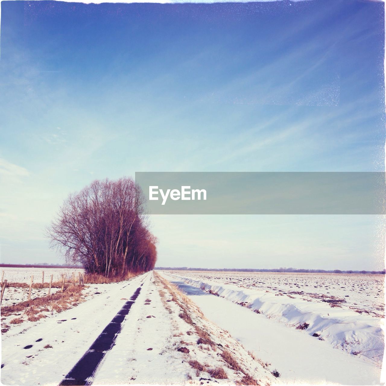 View of snowcapped landscape against sky